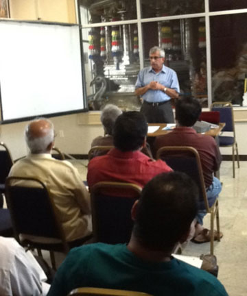 Dr. Jay Raman addressing the delegates at the Kerala Hindu  Heritage Seminar