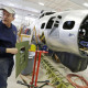 Project manager Randy Kemp works on a panel for an engine housing for a B-17 World War II-era bomber being built with salvaged and fabricated parts at the Champaign Aviation Museum in Urbana, Ohio. Kemp, a 56-year-old aircraft engineer, oversees about 10 volunteers and is the only paid employee for the project