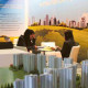Real estate developers and visitors at a recent Indian Property Show in Dubai. A new survey suggests that NRIs are optimistic that India will be more investor-friendly after the elections.
