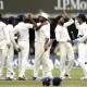 Ravindra Jadeja, second right, celebrates with his teammates after running out England's James Anderson to
win the Test match at Lords cricket ground, London