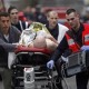 Hunt for 2 in French shooting that killed 12; 1 surrenders