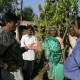 Dr Kiran Patel with Mota Falia locales explaining the importance of hygiene