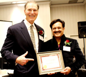 NFL Alumni President Allan Kennedy and Honoree Dr. Romesh Japra