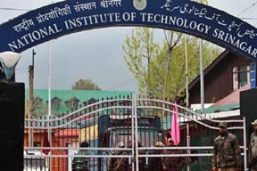 J&K Police personnel standing guard inside National Institute of Technology (NIT)Srinagar day after students clash following altercation over cricket match. Express Photo by Shuaib Masoodi 02-03-2016