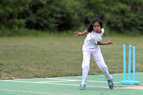 Pooja Ganesh, 8. Of Chrsterfield, practices bowling