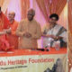 Dr Subramaniam Swamy addressing the Dallas audience, and (left) being honored and recognized at the event