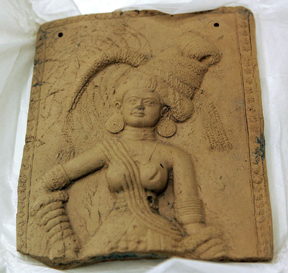 One of seven stolen artifacts that were on display at the Honolulu Museum of Art is shown in a secure room of the museum’s basement, in Honolulu