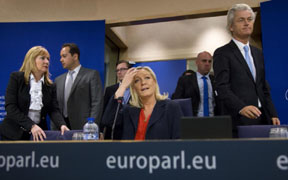 French far right party, Front national, President Marine Le Pen, center, arrives for a media conference with other far right leaders at the European Parliament in Brussels on Tuesday, June 16.