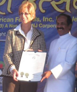 Dr Naram receiving award from former NJ Governor Christine Whitman