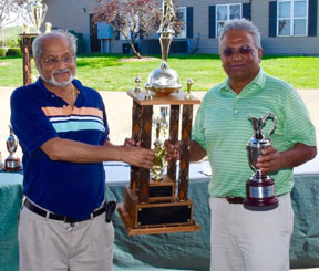 Andy Patel giving trophy to senior champion Sharad Shah