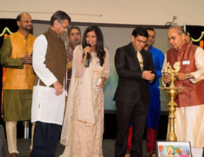 Indian Consul O P Meena lighting the lamp when the Gayatri Mantra was recited.