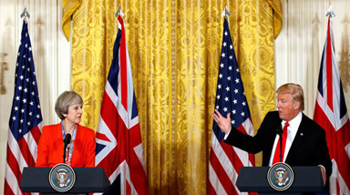 British Prime Minister Theresa May listens as U.S. President Donald Trump speaks during their joint news conference at the White House in Washington, U.S., January 27, 2017. REUTERS/Kevin Lamarque