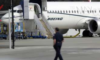 Boeing to make safety feature standard on troubled Max jets Boeing to make safety feature standard on troubled Max jets