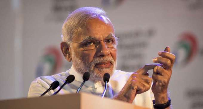Modi promises collateral-free loan, insurance, pension, credit card as he woos traders