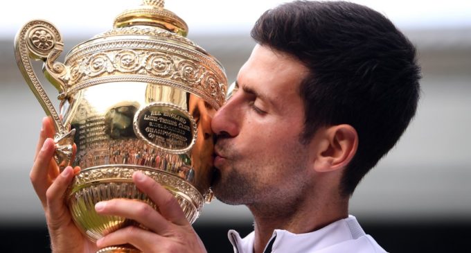 Djokovic saves match points to claim fifth Wimbledon title in record-breaking final