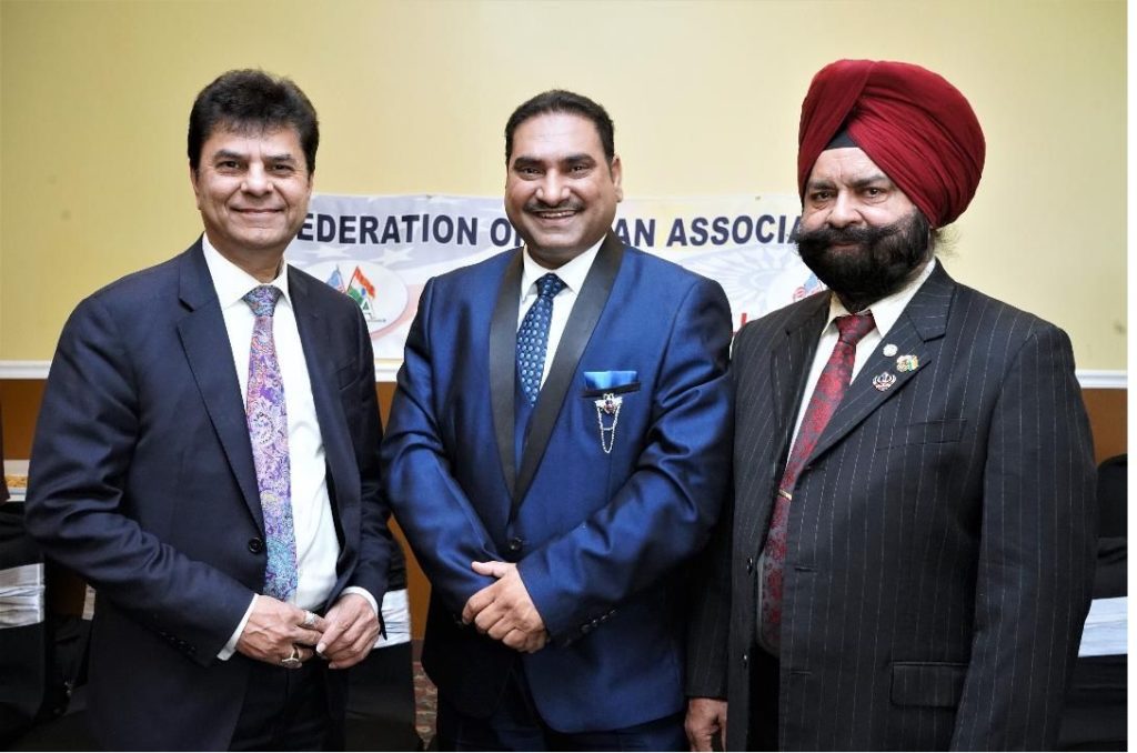The incoming FIA chief Gurmeet Singh (center) with founder president Sunil Shah and founding former president Onkar Singh Sangha