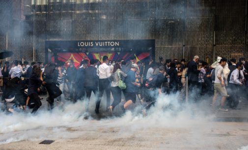 Police shoot protester, man set alight in day of Hong Kong fury