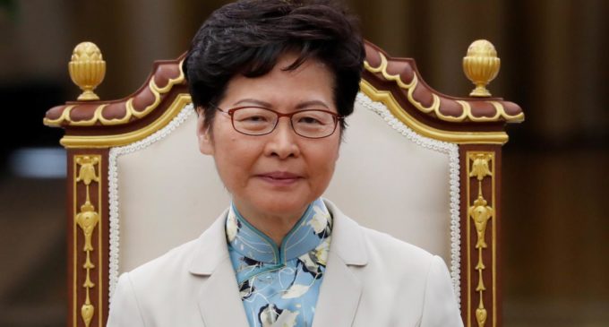 Hong Kong leader says new US law, violence will harm economy