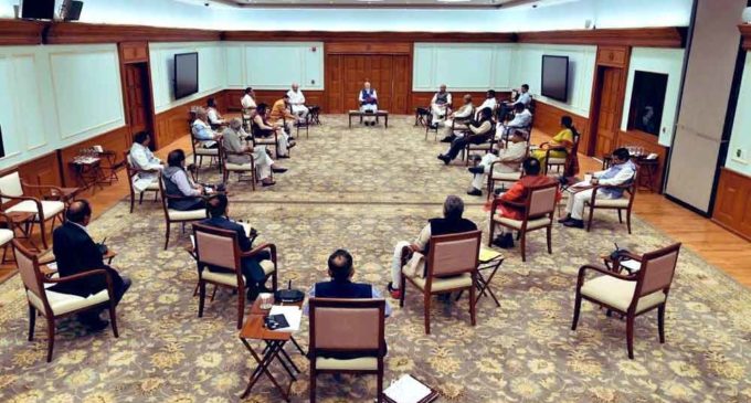 PM follows social distancing norms during the cabinet meet