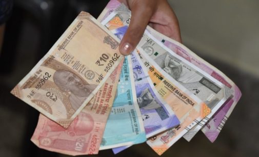 Rupee hits new record low of 76.82/$