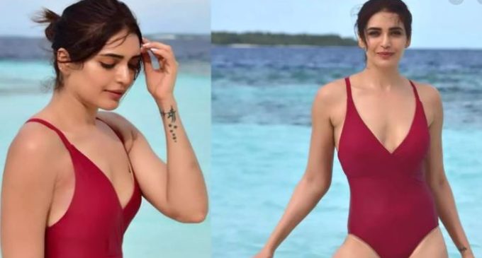 Karishma Tanna pulls of inverted yoga pose with injured foot