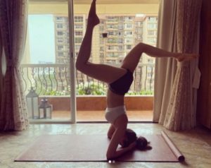 Karishma Tanna pulls of inverted yoga pose with injured foot