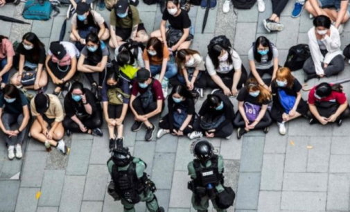 Protesters take to streets against Chinese anthem law in HK