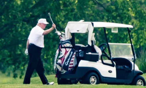Trump back on golf course as US gradually reopens