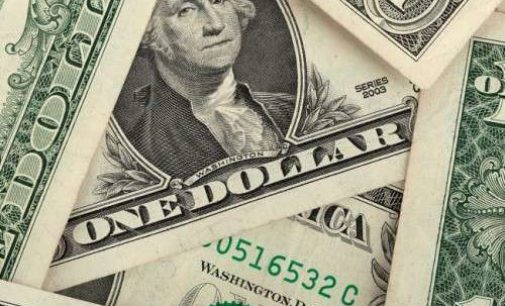 US dollar climbs amid economic data