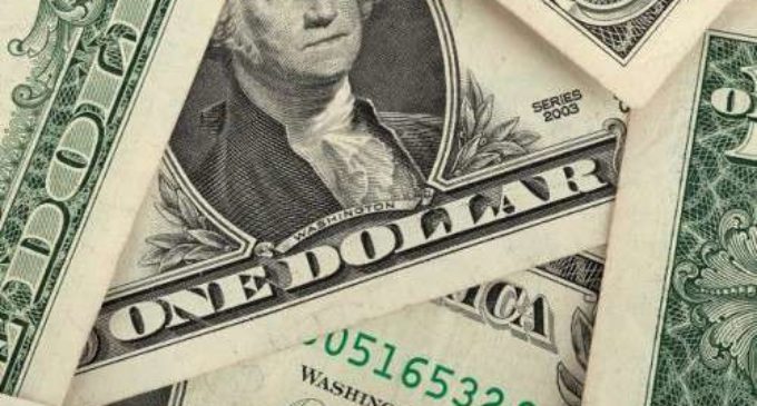 US dollar climbs amid economic data