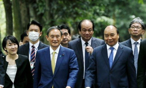 Japan, Vietnam agree to boost defence ties, resume flights