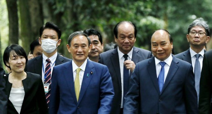 Japan, Vietnam agree to boost defence ties, resume flights