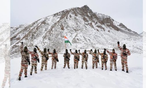 Republic Day: ITBP jawans march with national flag on frozen water body in Ladakh