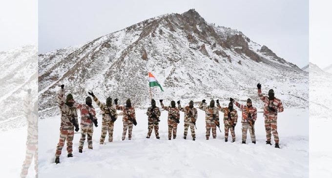 Republic Day: ITBP jawans march with national flag on frozen water body in Ladakh