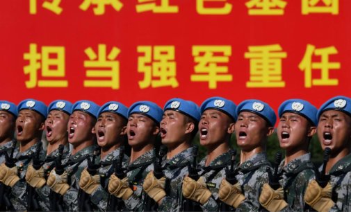 China marches on to militarism and totalitarianism