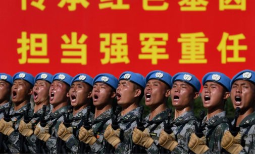 China marches on to militarism and totalitarianism