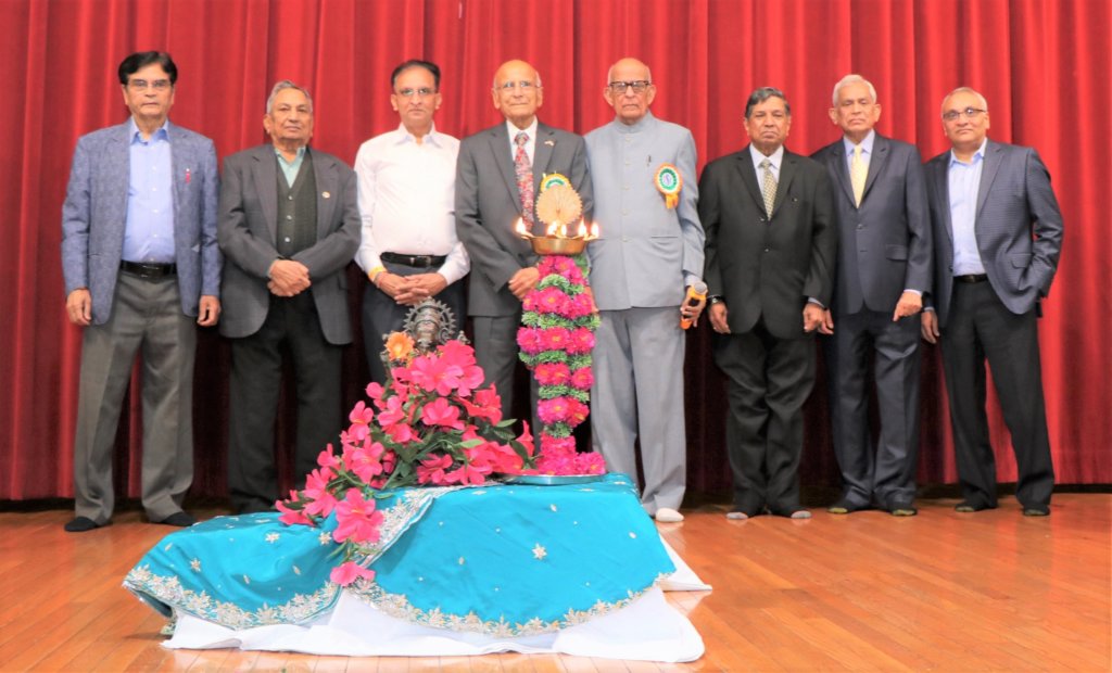 Deep Pragatya ceremony performed by L to R: Bhartiya Sr. of Chicago president Haribhai Patel, Manav Seva Mandir Trustee Board Chairman Bhaskar Patel, ISC President Dr Narsinhbhai Patel, Priest Anantbhai Raval, Manav Seva Mandir Journal Secretary Dahyabhai Patel, Chief Guest Chhotubhai Patel Executive Board President Sandip Patel