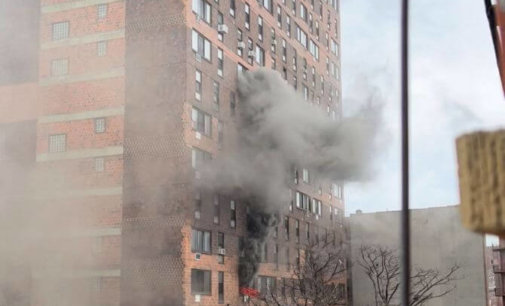 Nine children among 19 dead in massive fire at New York building