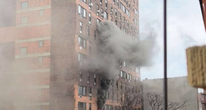 Nine children among 19 dead in massive fire at New York building