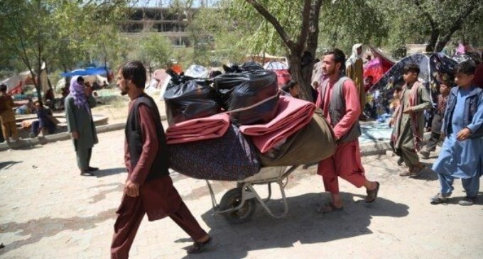 Over a million Afghans flee to Iran as economy collapses