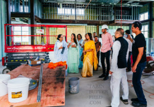 Hema Malini being guided through the new temple by Premananda Devi Dasi