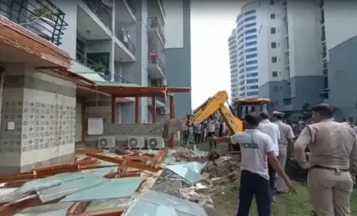 UP: Bulldozers demolish illegal construction at home of man who misbehaved with woman at Noida society
