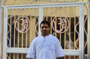 President of Satsang America, Subrat Mohanty, stands in front of Valley Hindu Temple.